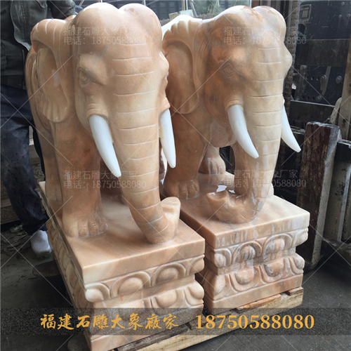 风景动物雕塑晚霞红石头大象